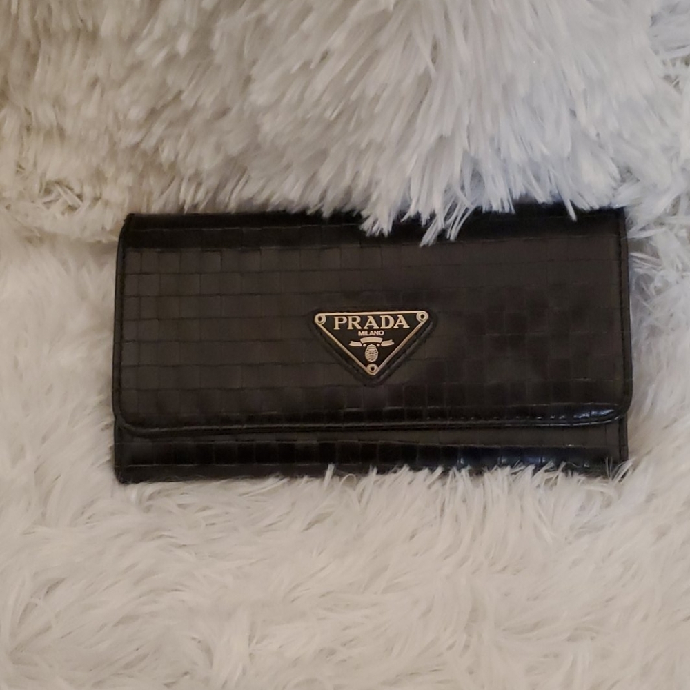 Trifold Prada Clutch, unknown authenticity